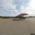 Female experiencing drug withdrawal symptoms in parking lot