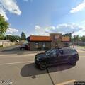Officer checks vehicle at Dairy Queen parking lot