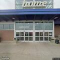 Car hits concrete barrier in store parking lot