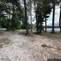 Man with treble hook stuck in hand at campground