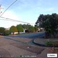 Motorcycle hits curb, rider walking at scene