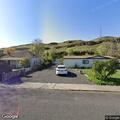 Two men fighting outside West Martin Street address