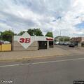 Man unresponsive but breathing at bar patio in Carlton