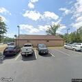 Vehicle hits post office building, no injuries