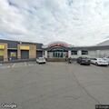Person found slumped over in vehicle at airport depot