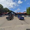 female with broken wrist in parking lot at Zorbaz
