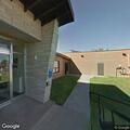Officer transports woman in custody to jail