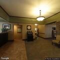 Person having difficulty breathing at hotel lobby