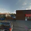 Canopy falls onto car behind pharmacy