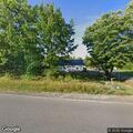 Caller threatens to shoot loose dog in yard