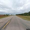 Deer blocking traffic lane on Highway 371