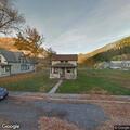 Car leaves roadway near RV home, possible DUI