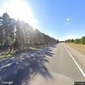 Person littering along roadside near Pine Manor