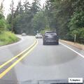 Disabled sedan blocking roadway at intersection