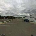 Woman hitting man and throwing items in moving car