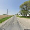 Car hits deer and roadside fixture on County Road 7