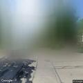 Person running in traffic on Halsted Avenue
