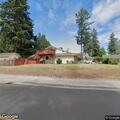 Person experiencing chest pain at family home