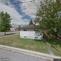 Male yelling for help near old bus garage