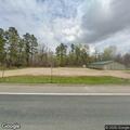 Suspicious person reported running from woods with rifle toward black SUV