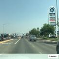 Woman running in traffic and throwing rocks