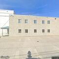 Person with cardiac emergency at warehouse on Main St