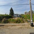 Unoccupied car blocking driveway on 39th Avenue