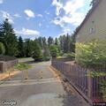Woman lying on road on Southeast Kingley Road in Sammamish