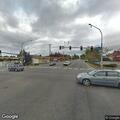 Person running in and out of traffic in Lynnwood