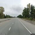 Debris blocking two lanes on highway near milepost 6