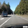 Erratic white work van on Highway 104 eastbound