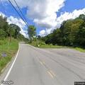 Tree on wires blocking Scenic Drive roadway