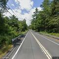 Driver reports being forced off road by pickup truck
