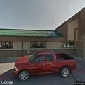 Person experiencing foot pain at Kalispell store