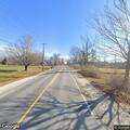 Green truck driving erratically on Webbs Mills Road