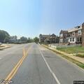 Unoccupied vehicle blocking Garrison and Duval