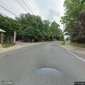 Car crash into tree with person trapped