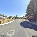 Person walks away from EMS at Apple St in Pagosa Springs