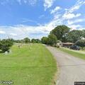 Hay baler fire in backyard on Mint Drive