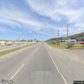 Car leaves road and hits business mailbox