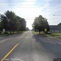 Person walking in roadway nearly struck by car