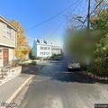 Vehicle blocking roadway on Front Street