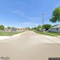 Parking violation involving unplated white SUV