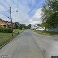 Officer pursues fleeing suspect on Garfield Avenue