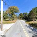 Vehicles drag racing on E Arlington Road