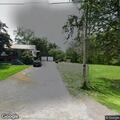 Utility wires down behind Bear Creek Street home
