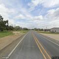 Traffic backup and lane changes on FM 156 in Krum