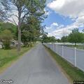 EMS assists man into residence near North Street