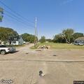 Suspicious person pushing motorcycle on 23rd Street