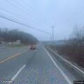 Single-car crash with driver trapped in ditch